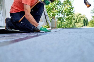 What To Expect During A Professional Tar Roof Torchdown Repair